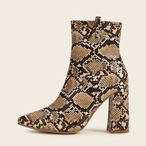Point toe snakeskin chunky heeled boots